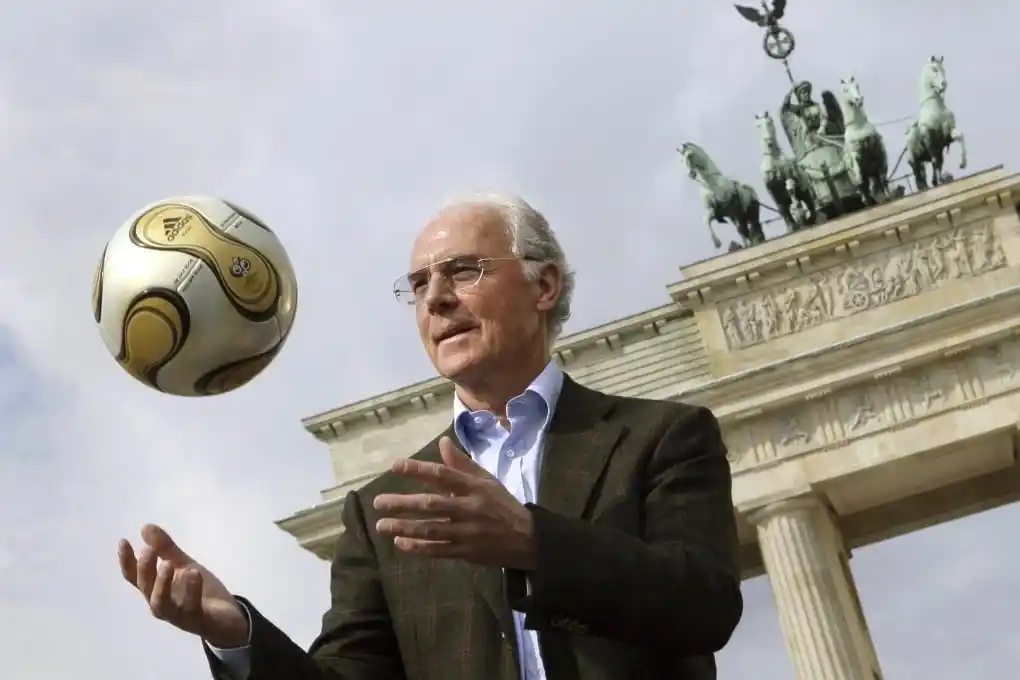Franz Beckenbauer lifting the World Cup trophy for West Germany in 1974.