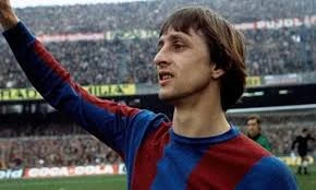 Cruyff wearing the iconic Netherlands orange jersey performing the famous Cruyff Turn.
